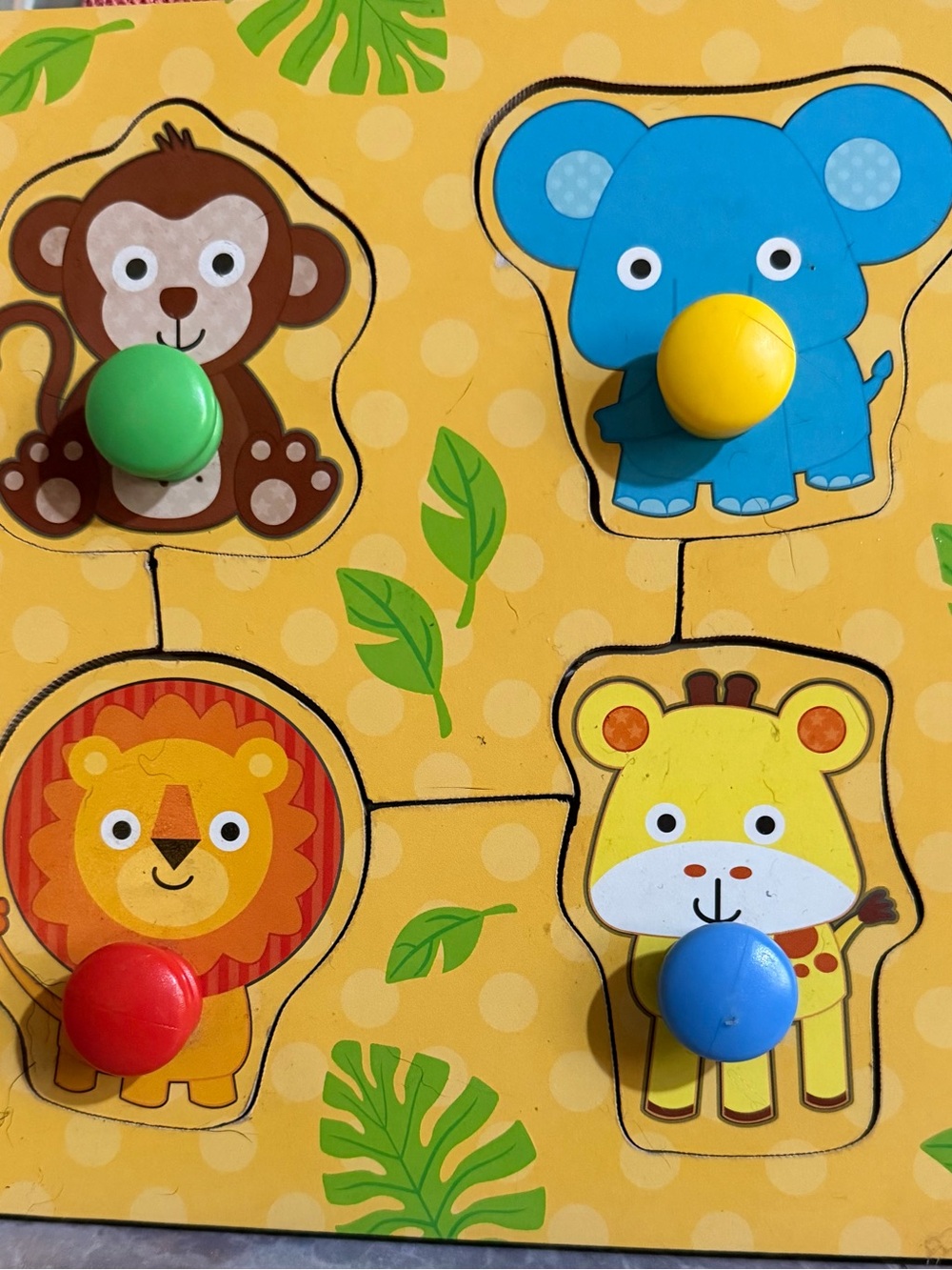 Kids Animal Puzzle Board - Yellow with Blue, Green, Red, and Yellow Pegs